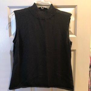 Woman’s sleeveless turtleneck top.